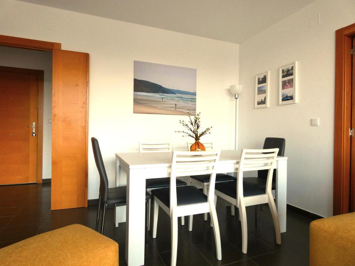 Апартаменты A De Quique. Apartamento A Pie De Playa. Коркубион
